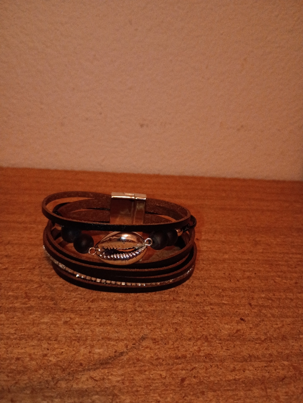 Multi‑strand Black Leather Bracelet with Cowrie Charm
